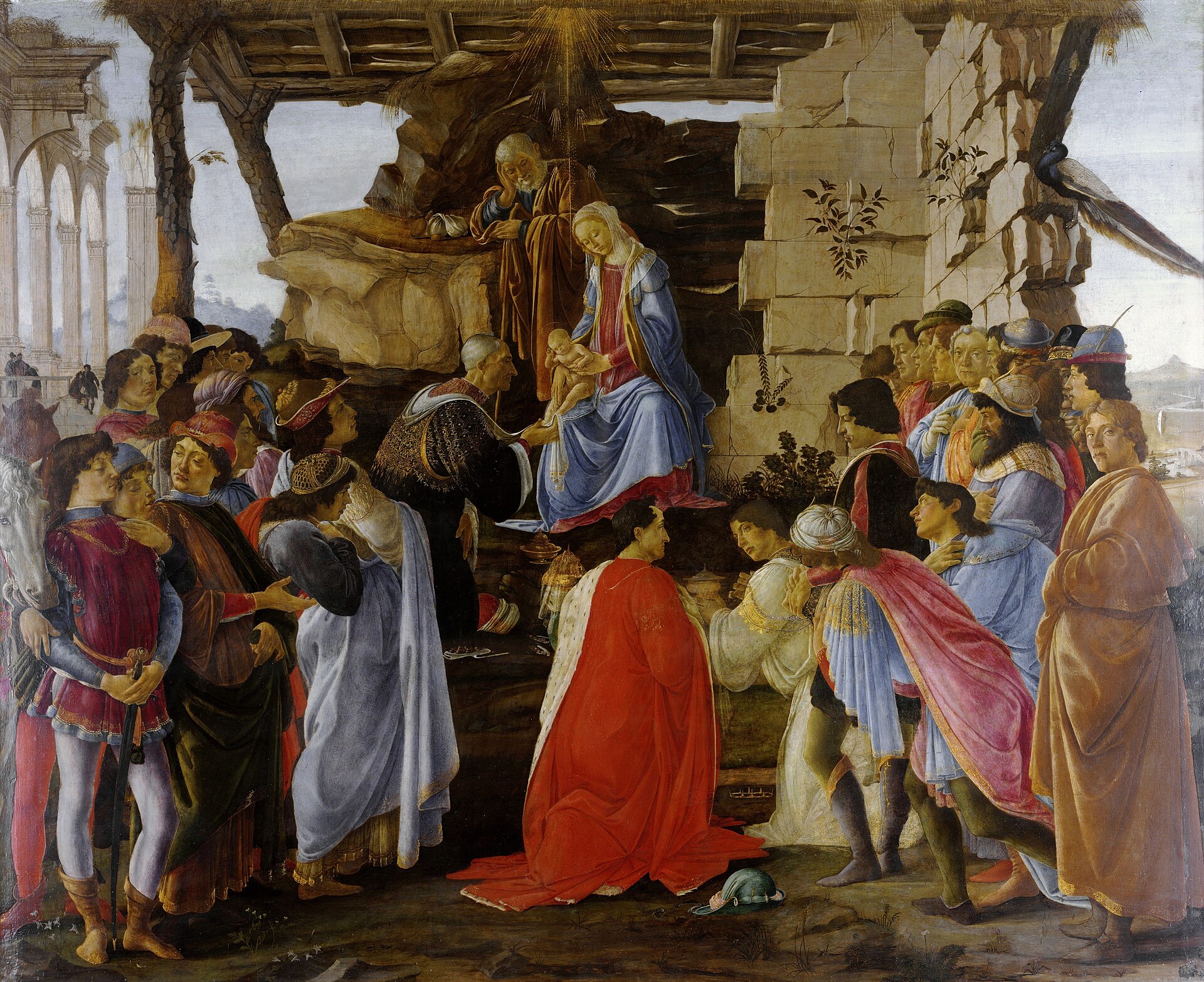 Sandro Botticelli's Adoration of the Magi, painted around 1475 for the Florentine banker Gaspare di Zanobi del Lama, with the Holy Family seated in front of a ruined classical building and a crowd of richly-dressed contemporary Florentines arranged across the foreground in two wings.