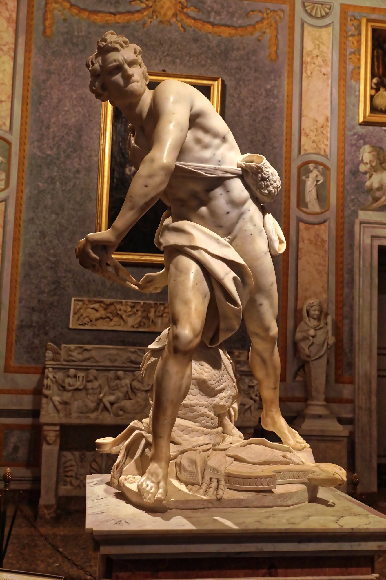 Gian Lorenzo Bernini's David in the Galleria Borghese, a marble sculpture of David loading his slingshot