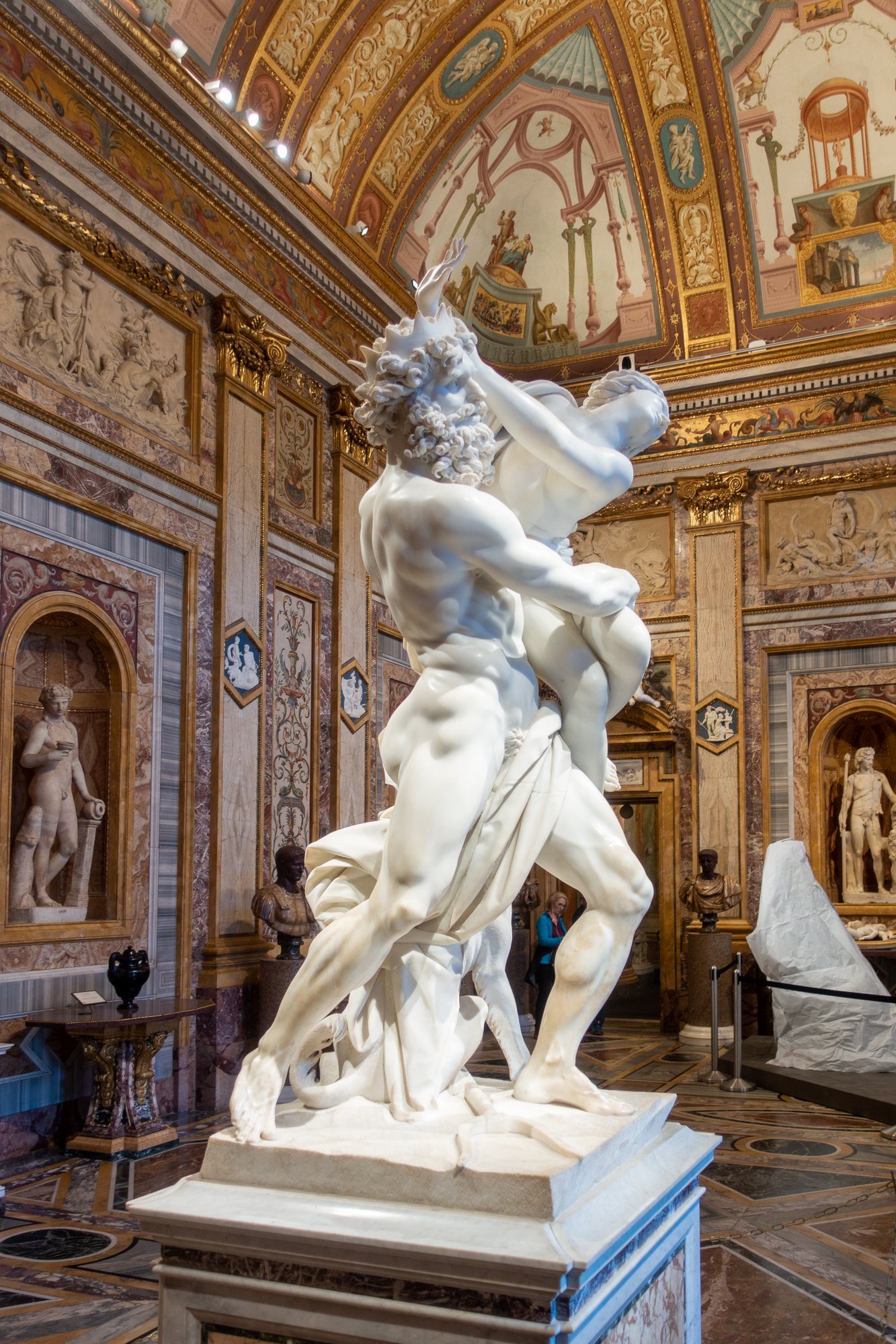 Detail of Bernini's Rape of Proserpina showing Pluto's fingers pressing into Proserpina's marble thigh