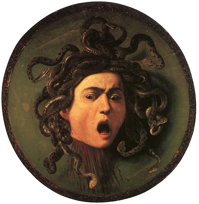 Caravaggio's Medusa, painted around 1597 on a circular leather-covered wooden shield, the snake-haired severed head still screaming at the moment of decapitation.