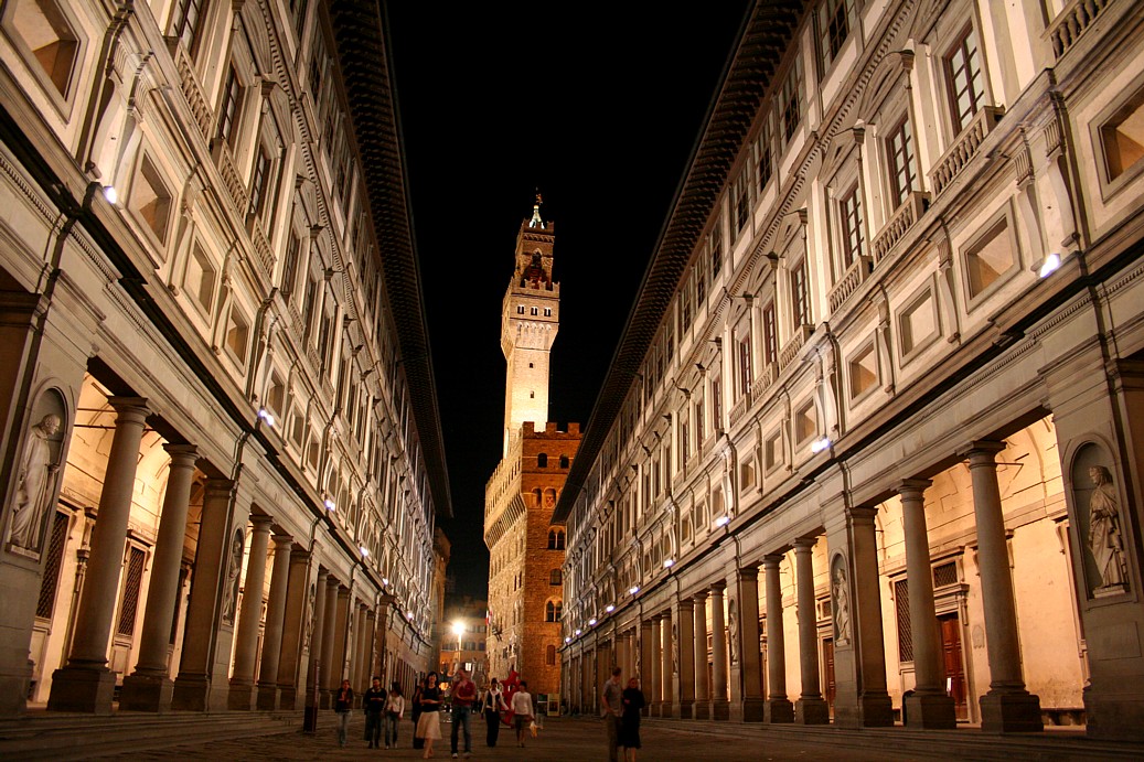 The U-shaped Uffizi seen from along the Arno, the long courtyard between Vasari's two parallel wings running back toward Piazza della Signoria, where most visitors enter for ticketed admission.